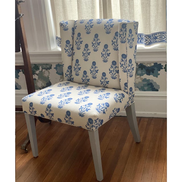 Pull up a chair! These beautiful accent chairs are upholstered in a classic blue and white floral design. Great for dining...