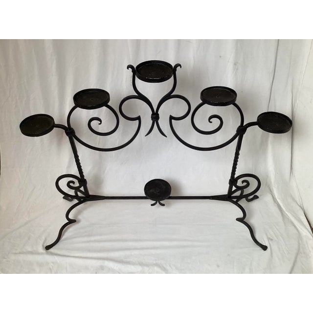 Large Black Wrought Iron Plant Stand or Candle Holder Holds 6 Plants or candles. Great for indoor and out door use. 42”...