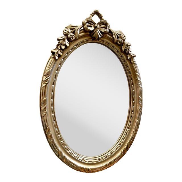 Oval Wall Mirror – Silver Leaf Frame With Ribbon Crest For Sale