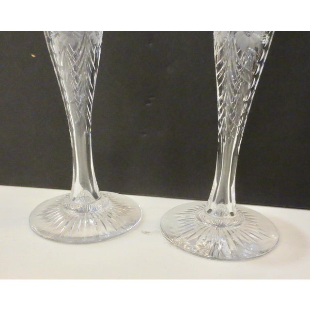 Cut-crystal pair of candlesticks. Circa 1910 English Edwardian made and cut crystal., These have a deep bobeche for long...