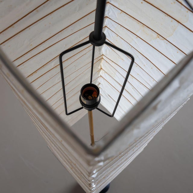 Floor Lamp with White Washi Paper Lampshade, Designed by Isamu Noguchi. This floor lamp features a delicate white washi...