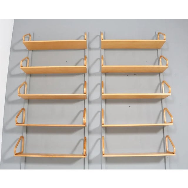 Stunning and elegant mid-century modern wall shelf 112b. Design by alvar aalto for artek finland. Striking finnish design...