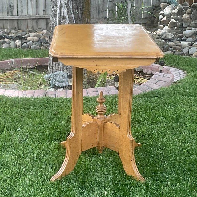 Blonde wood, white oak and/or maple Eastlake Occasional Table circa 1870-1890. This small table is unusual because of the...