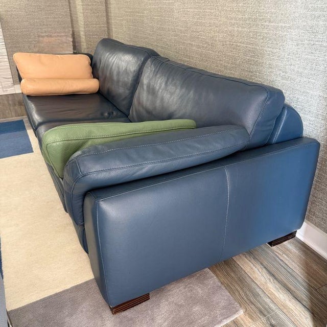 Roche Bobois Leather Sofa A handsome and spacious leather sofa from Roche Bobois. Upholstered in a rich, medium blue...