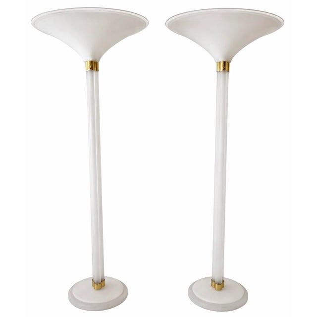 This pair of monumental torchiere floor lamps was designed by Karl Springer in the 1970s and is constructed from...