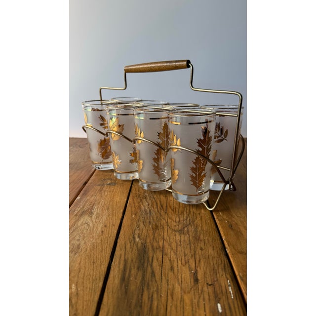 Iconic Mid-Century SophisticationElevate your bar cart with this spectacular, complete set of eight (8) vintage "Golden...