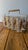 Iconic Mid-Century SophisticationElevate your bar cart with this spectacular, complete set of eight (8) vintage "Golden...