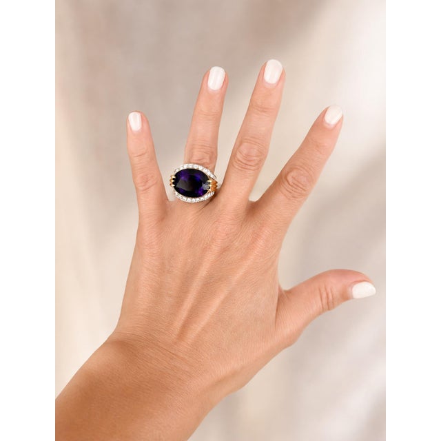 A striking signed cocktail ring by Italian jeweler TRIO, crafted in a substantial combination of 18-karat yellow and white...