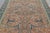 Hand-knotted in wool, this 7x10 vintage European rug is a sophisticated example of mid-century interpretations of...