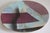 A very cool 1980s hand painted platter with a bold geometric motif over what appears to be clouds or ice-like background....