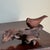 A beautiful mid-20th century hand carved wood bird mounted on driftwood. Attributed to Pennsylvania artist Ethel Yeagle...
