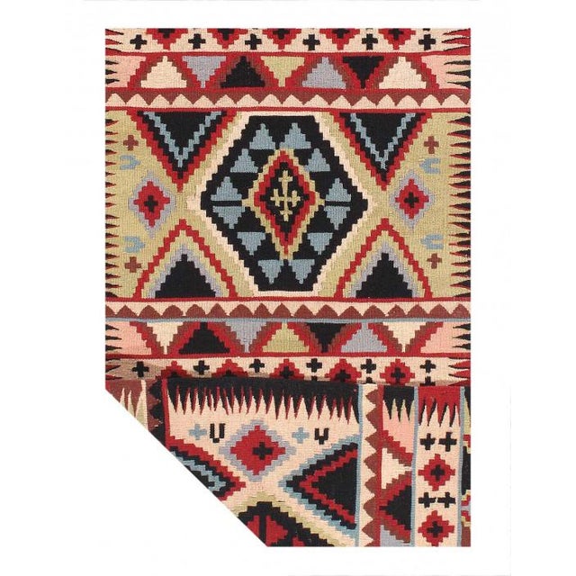 A kilim rug is a flat-woven rug. Kilim rugs are known for their intricate geometric patterns, vibrant colors, and durable...