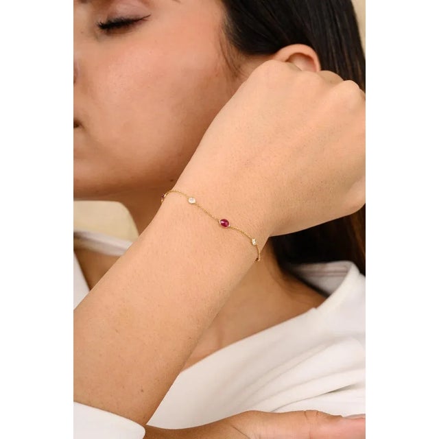 This is part of Chairish’s Fine Jewelry assortment. This Minimal Natural Ruby Diamond Chain Bracelet in 18K gold showcases...