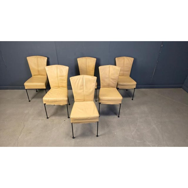 Set of 6 yellow/cream leather curved dining chairs in the manner of Gerard Van Den berg for Montis. Beautiful curvy design...