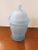 This is a Vintage Indiana Glass Satin Frosted Baby Blue Glass Apothecary Lidded Ginger Jar. It measures 10" high to top of...