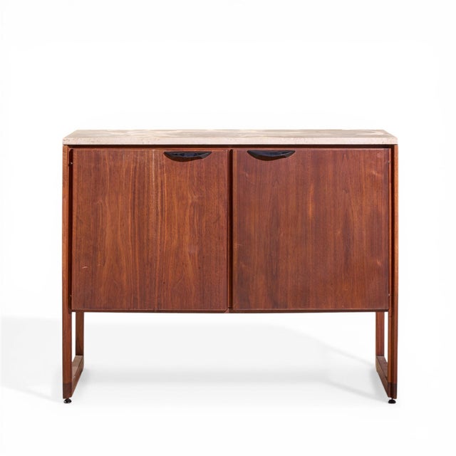 Jens Risom Mid Century Walnut and Marble Top Credenza This credenza measures: 44.25 wide x 19 deep x 34.75 inches high...