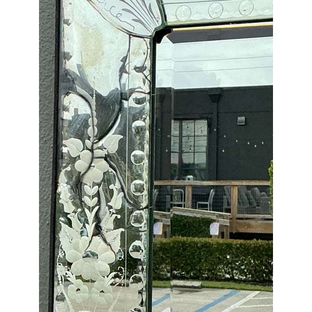 Exude Old World opulence with this exquisite vintage Venetian mirror, a masterwork of Italian glass artistry. This piece...