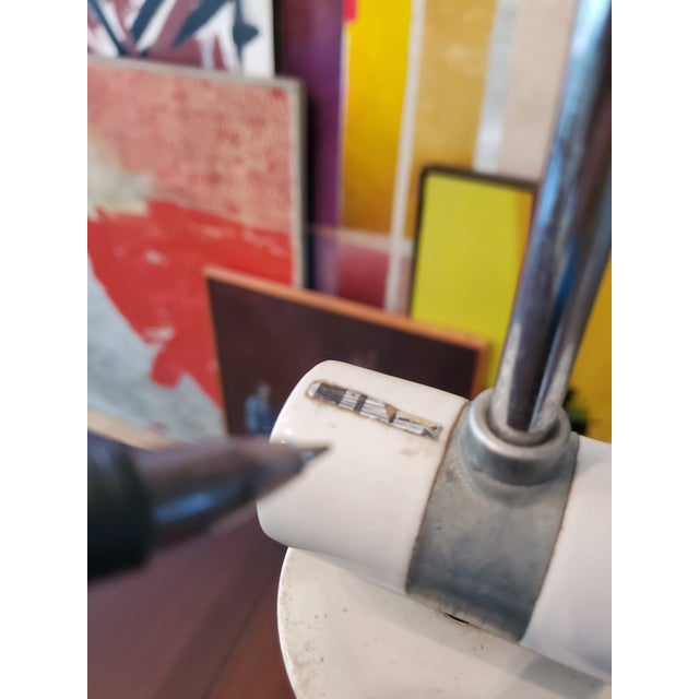 A vintage original circa 1960's eames knoll style lamp . Having a partial label near one light socket ( see image ) with...