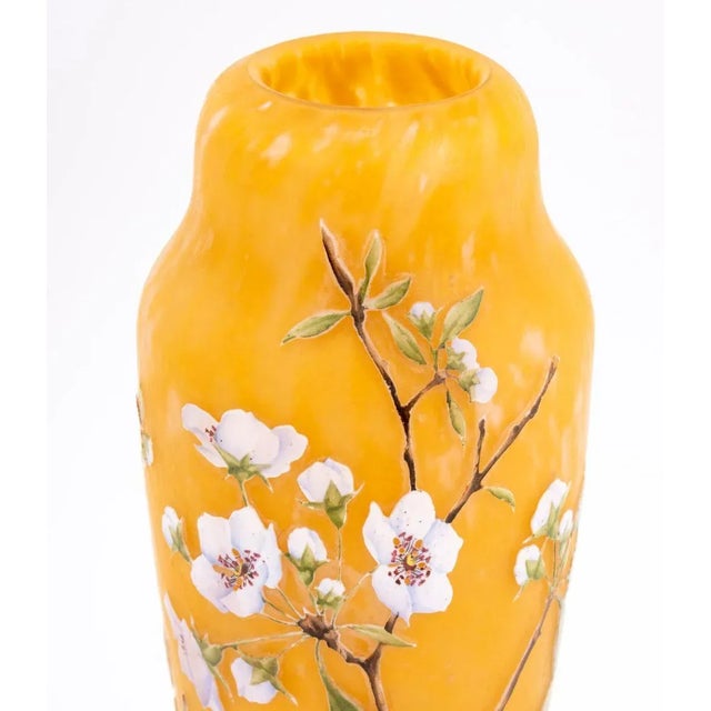 Daum Nancy Cameo Cut and Enameled Art Glass Vase, circa 1900, the tapered body with a mottled gradient of apricot and rose...