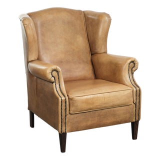 Light Cowhide Wing Armchair with a Timeless English Look and Good Seating Comfort For Sale