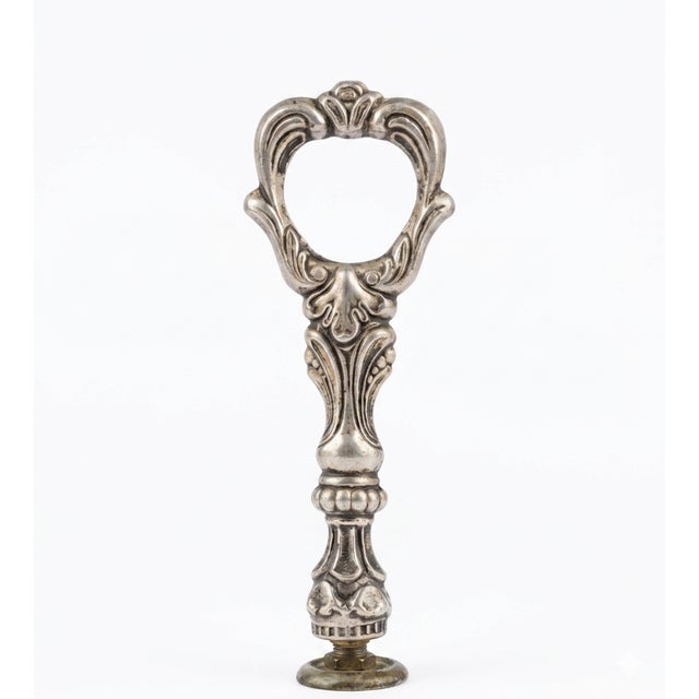 Add a touch of dramatic, old-world glamour to your space with this exquisite vintage pedestal. This piece is the epitome...