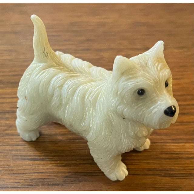 Carved hardstone dog figure of a West Highland Terrier. Exceptional quality and detail. Measures 2 3/4" x 1 1/4" x 2 1/4"...