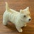 Carved hardstone dog figure of a West Highland Terrier. Exceptional quality and detail. Measures 2 3/4" x 1 1/4" x 2 1/4"...