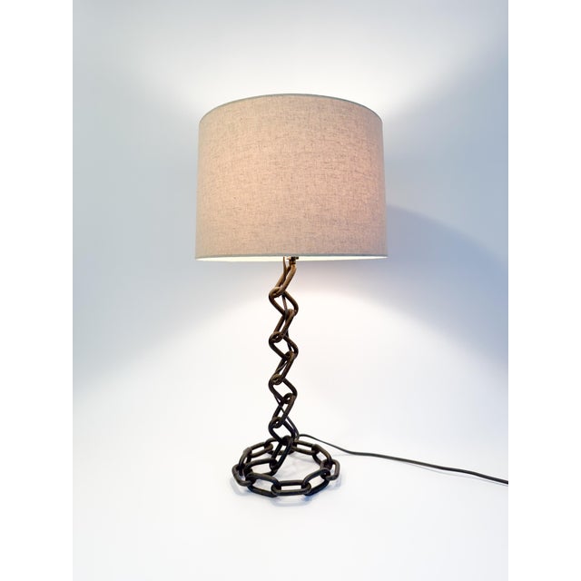 Make a bold statement with this sculptural table lamp, a striking example of Brutalist design. Crafted from oversized,...