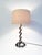 Make a bold statement with this sculptural table lamp, a striking example of Brutalist design. Crafted from oversized,...