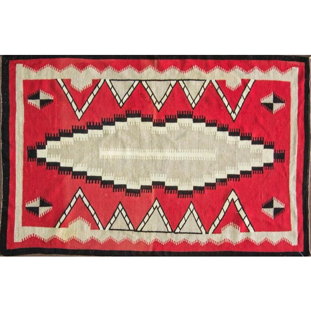 45" x 75" Unusual Eye-dazzler Navajo Rug, c-1890 in excellent condition, A classic Navajo rug circa 1890's in excellent...