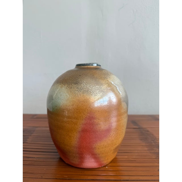 This one-of-a-kind boho ceramic weed vase celebrates the raw, elemental beauty of traditional studio pottery. Crafted with...