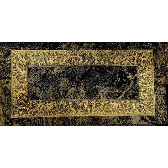 Piero Fornasetti Bordo Bassorilievo Coffee Table, Black and Gold, Milan, Circa 1955 A Piero Fornasetti coffee table is the...