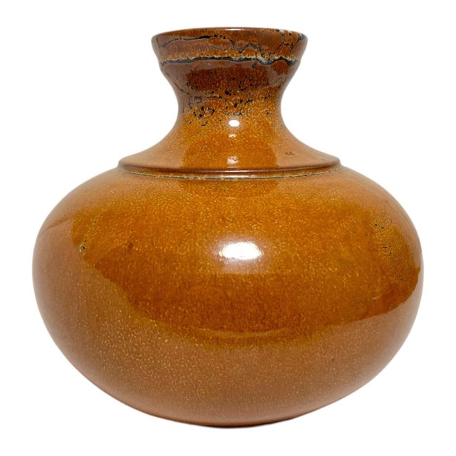 A charming old French porcelain vase with a beautiful glaze and a long history told in a series of repairs and multiple...