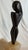 Mid-century modern hand-carved sculpture figure of a woman on an alabaster base.