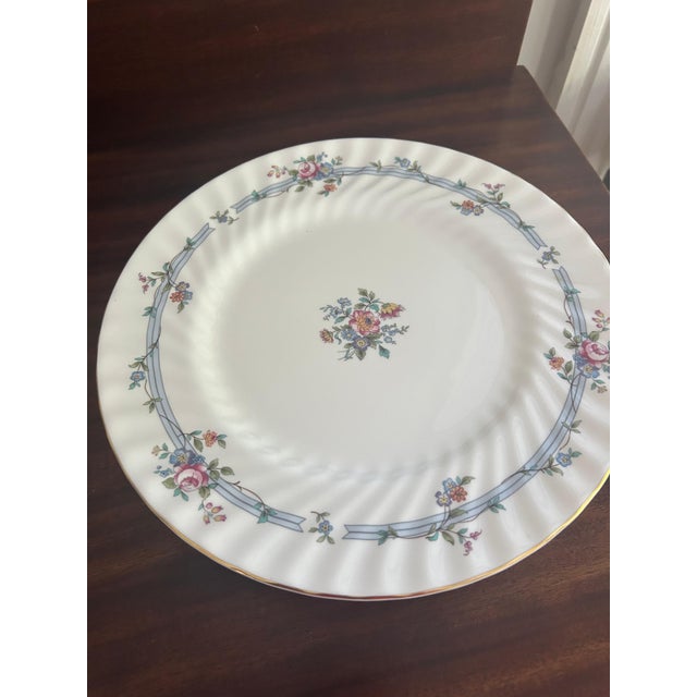 Fine bone Minton "Chartwell" china dinner plates (6), crafted by one of England's most celebrated porcelain manufacturers....