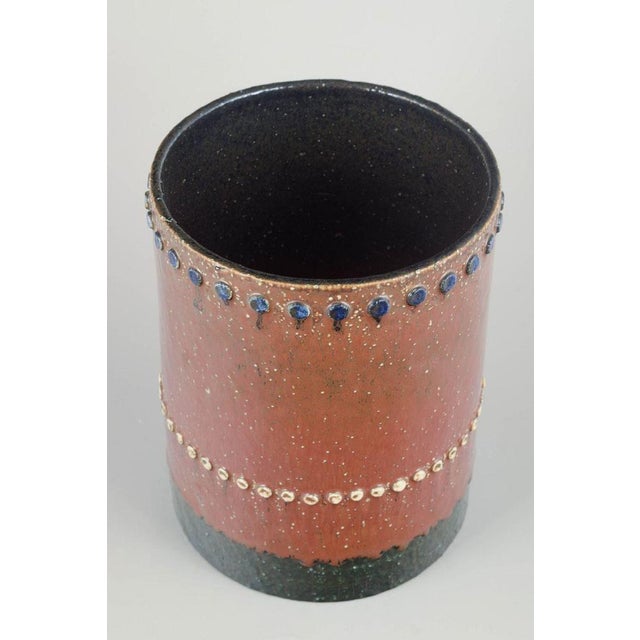 Sylvia Leuchovius for Rörstrand Vase, mid-20th century. Cylindrical hand-thrown stoneware vase with warm reddish-brown...