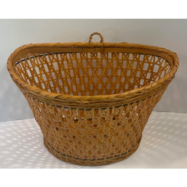 Nice vintage woven wall basket. Use for mail or a faux floral arrangement. I have two of these available.