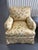 Pair of upholstered rolled arm chairs in a Scalamadre fabric called Millefiori. A floral pattern with a creme/ beige base....