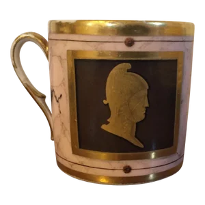 Antique Early 19th Century French Empire Paris Porcelain Coffee Can or Teacup With Portrait Busts, a Lyre and Trophies on Faux Marble Ground