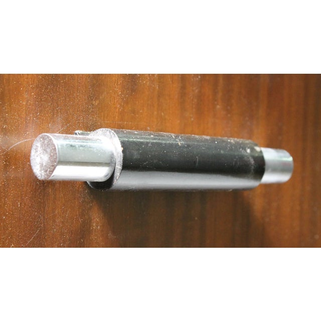 A great period Donald Deskey chest with exceptional wood grain. Chrome detailed handles and corner capping. This would...