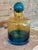 Striking vintage Waterford art glass decanter designed by Gerard Treacy, featuring a bold blue-to-amber ombré body with a...