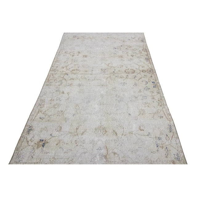 Washed out vintage rug from Oushak region of Turkey. Approximately 50-60 years old. In very good condition