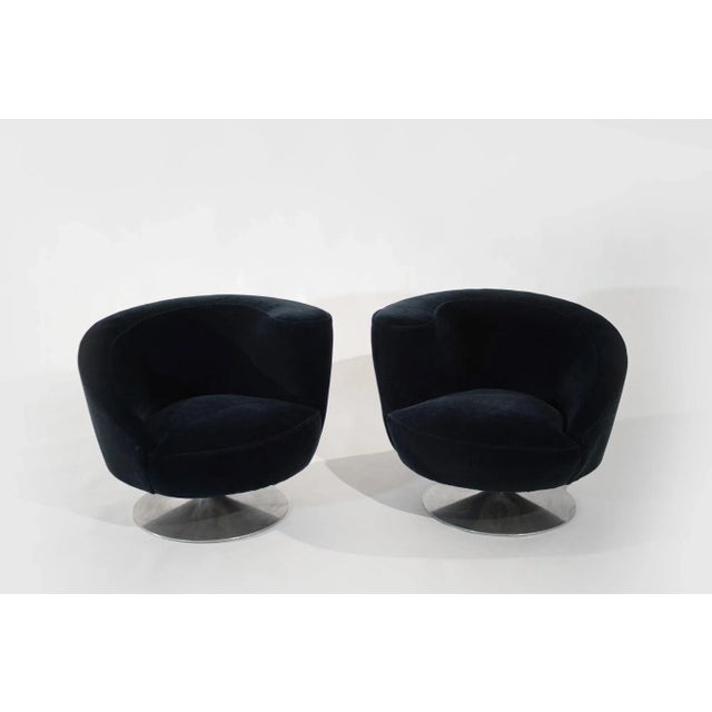 Rare pair of Corkscrew Swivel Lounge Chairs designed by Vladimir Kagan, circa 1970-1979. These chairs feature a unique...