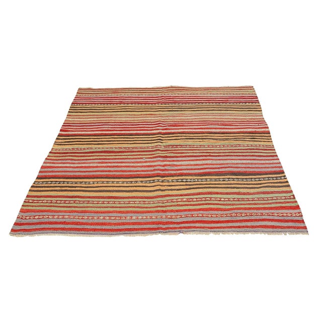 Handwoven vintage striped kilim rug from Denizli region of Turkey. Approximatelly 45-55 years old. In very good condition.
