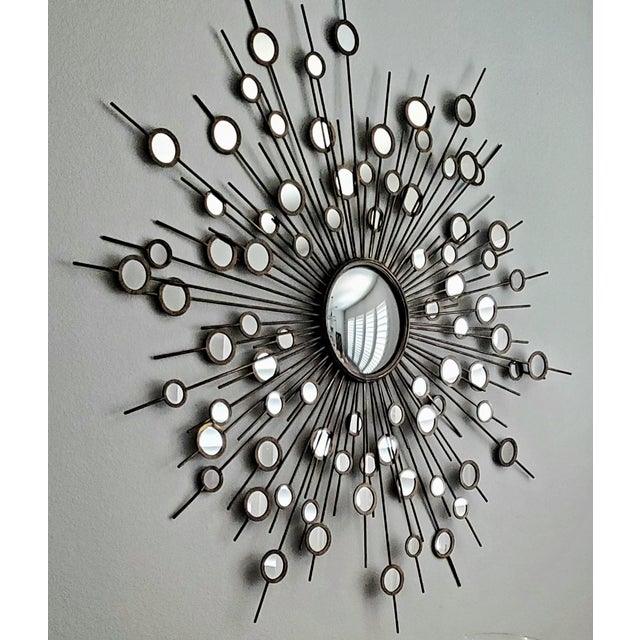Beautiful, oversized 63-inch Sunburst statement mirror originally purchased from Neiman Marcus. Officially cataloged at 63...