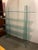 Tempered Glass Shelf. 4 glass shelves fit into the curved column cut-outs. Very solid design that sits very well! Columns...