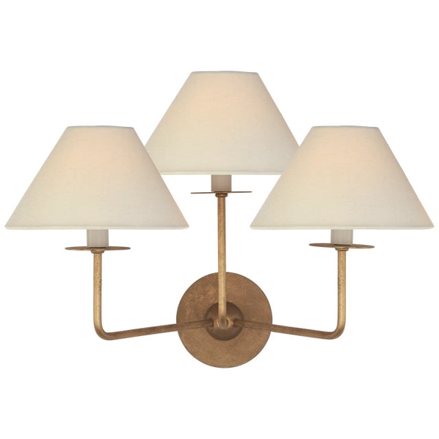 Kelley Medium Triple Sconce in Gilded Iron with Linen Shades Designer: Niermann Weeks Height: 14.25" Extension: 12.75"...