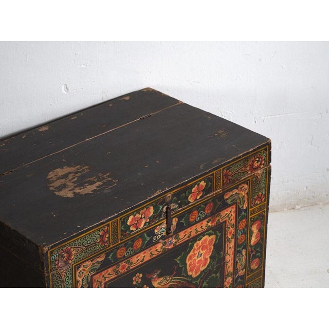 Antique painted Chinese trunk in pine wood, provincial painted furniture with polychrome composition originating from...