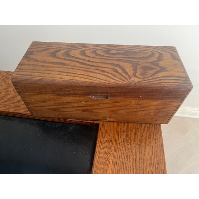 oak liqour holder for wine or liquor bottle from the 1950's/1960's. plays how dry i am when opened. condition consistent...