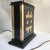 This wonderful lamp is made of black painted sheet metal. The base and top top are made of wood. The corners, application...